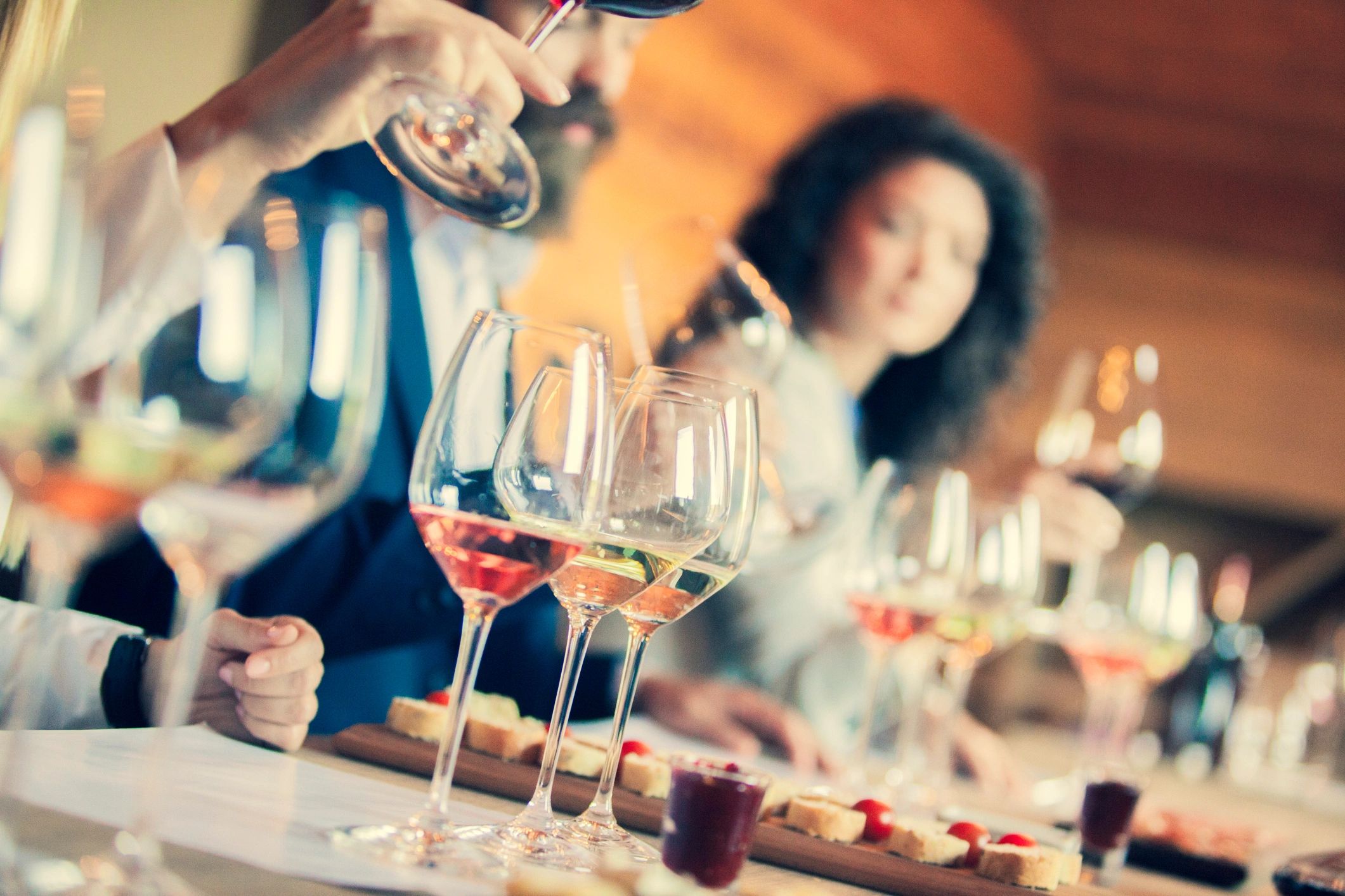 Wine glasses and charcuterie for blog article